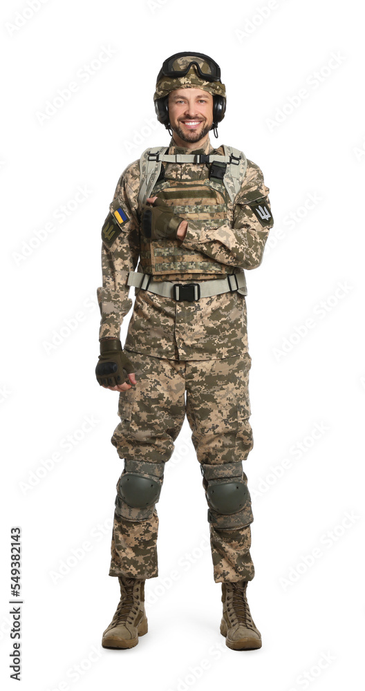 Soldier in Ukrainian military uniform with tactical goggles and headphones on white background Soldier in Ukrainian military uniform with tactical goggles and headphones on white background