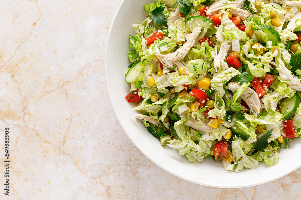 Chinese cabbage salad with chicken meat, top view. Chinese cabbage salad with chicken meat, top view.
