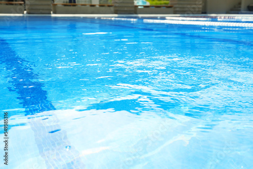 Outdoor swimming pool with clear rippled water