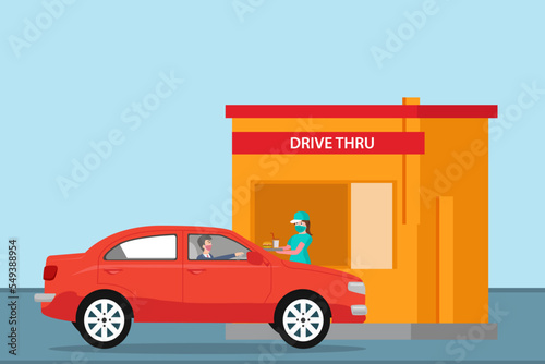 Customer receiving food at drive thru service