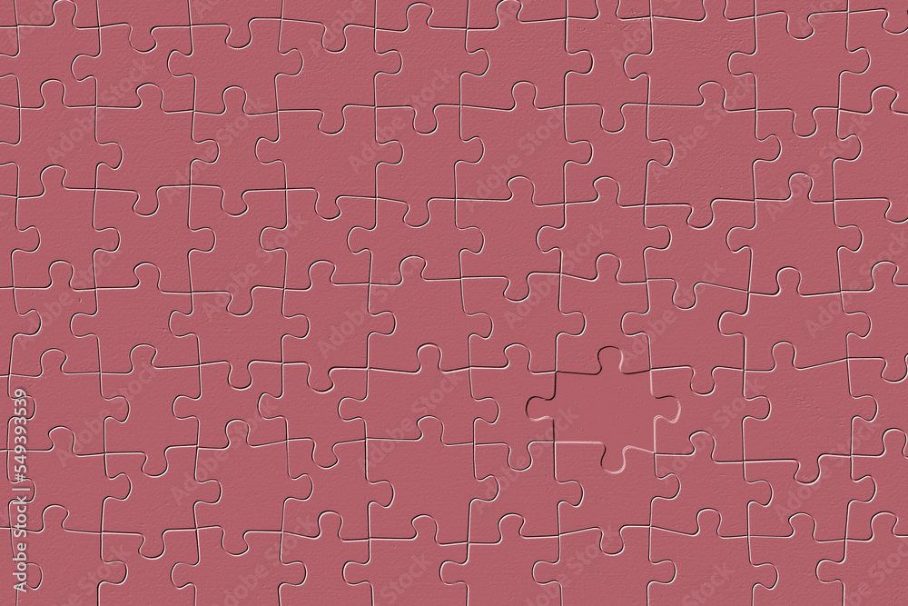 Embossed, missing piece of a red jigsaw puzzle.