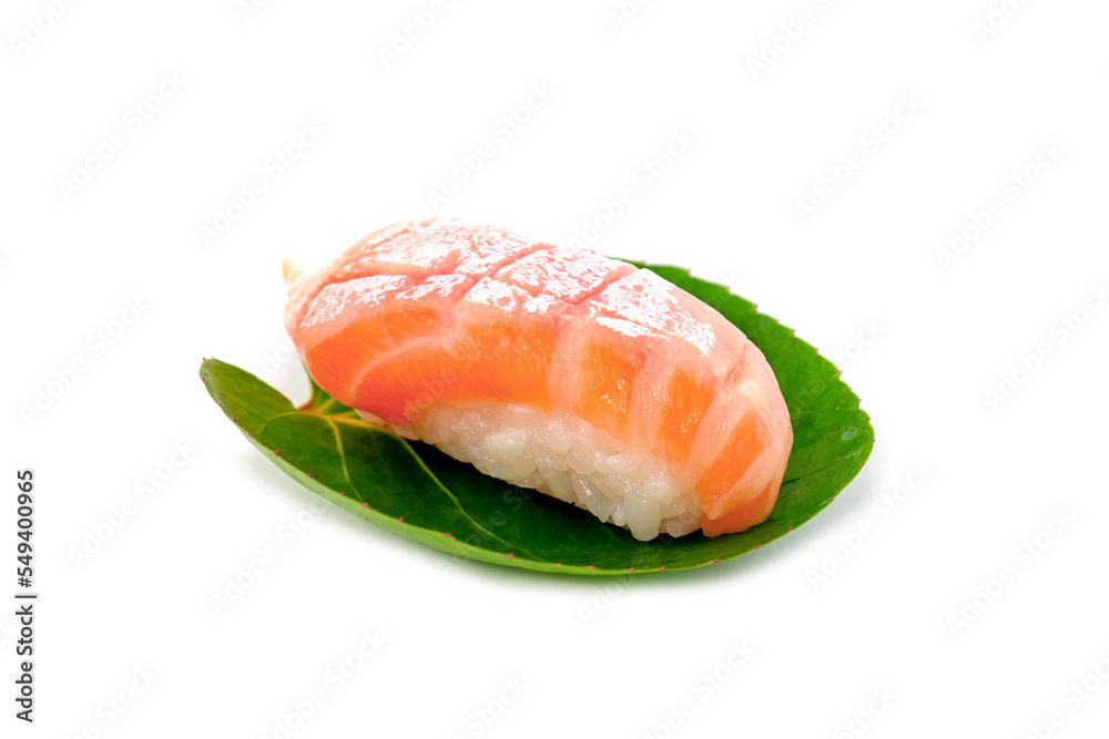 Salmon sushi on green leave isolated on white background.