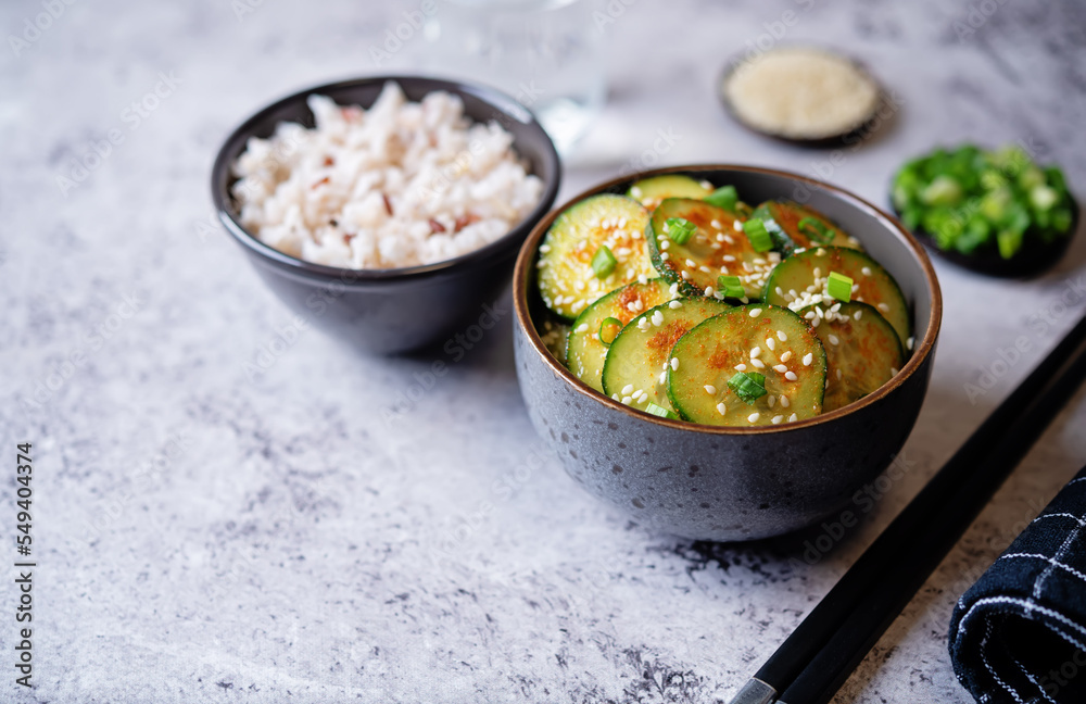 Spicy soy sauce cucumber salad in a bowl Spicy soy sauce cucumber salad in a bowl