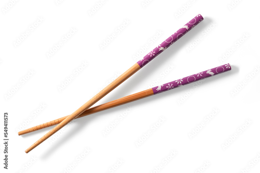 Wooden chopsticks isolated from the background Wooden chopsticks isolated from the background