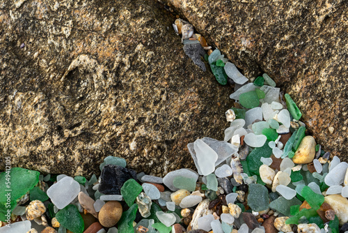 Colored crystals eroded by the sea in the beach of the crystals in the silleiro cape in Pontevedra photo