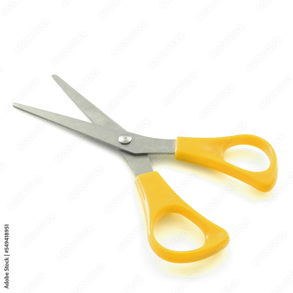 Yellow scissors isolated on a white background with shadows Yellow scissors isolated on a white background with shadows