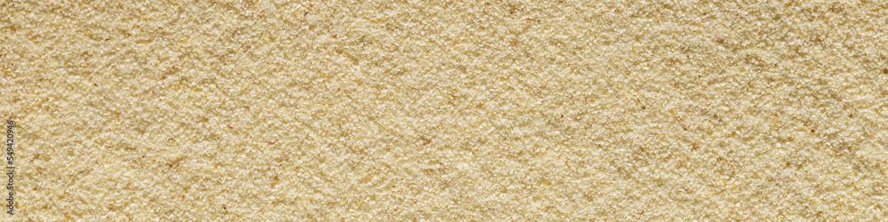 Banner horizontal sandy light smooth background format 4:1 sand macro photography