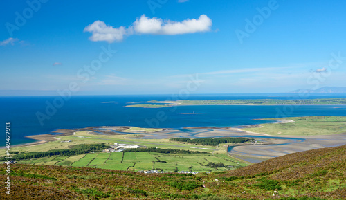 panoramic view from Knocknarea mountain over land and seascape of County Sligo, Republic of Ireland 