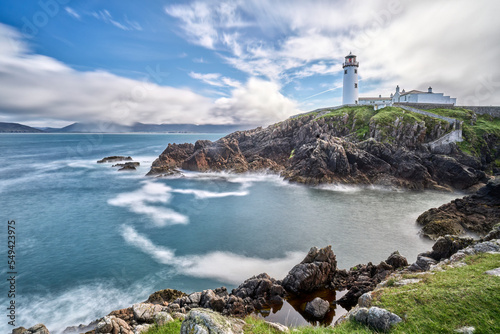 Fanad Head Lighthouse with its rough cliffs in the northern part of Republik of Ireland