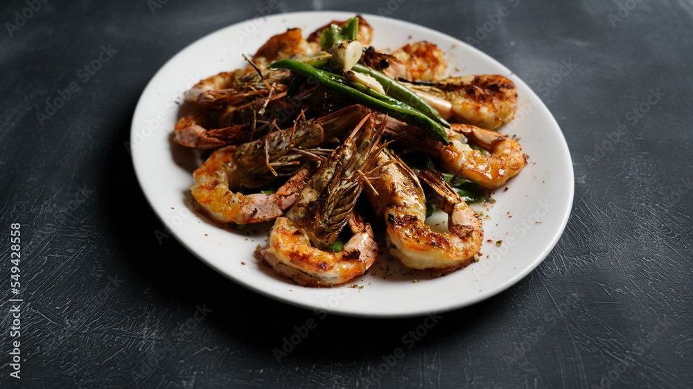 shrimp dish on black background shrimp dish on black background