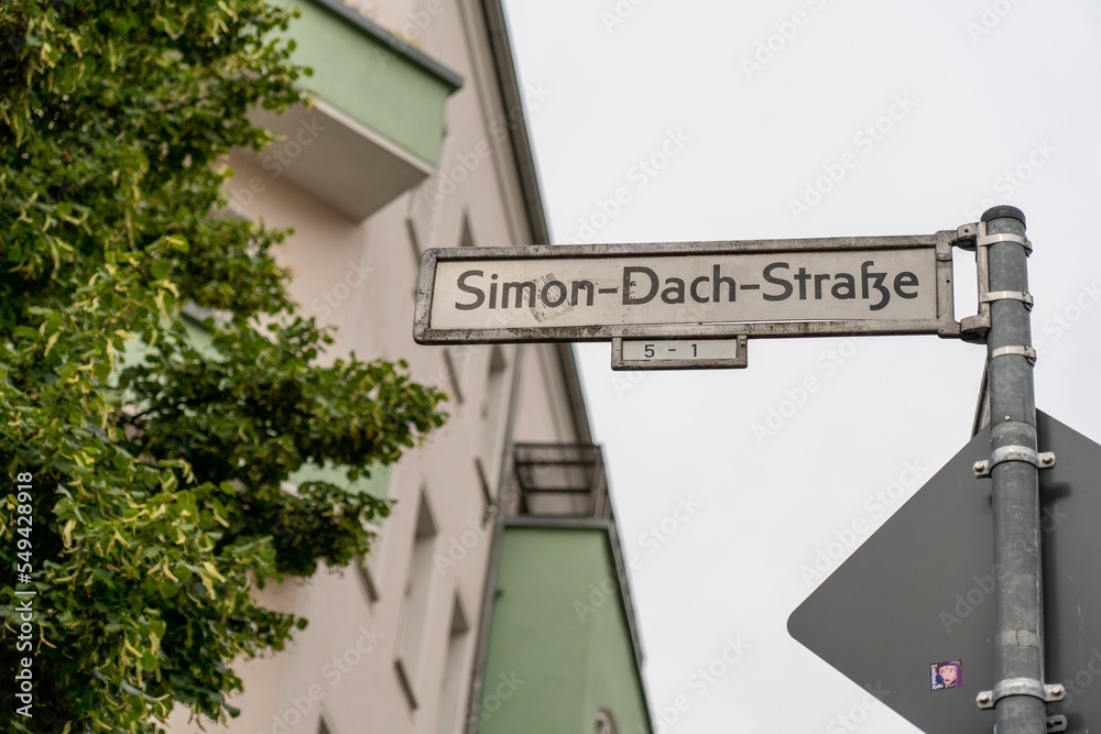 Obraz premium Low-angle shot of the street signs in Berlin, Germany