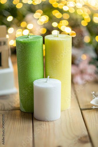 
Palm wax candles. Set of candles yellow, green, white. Christmas decorations