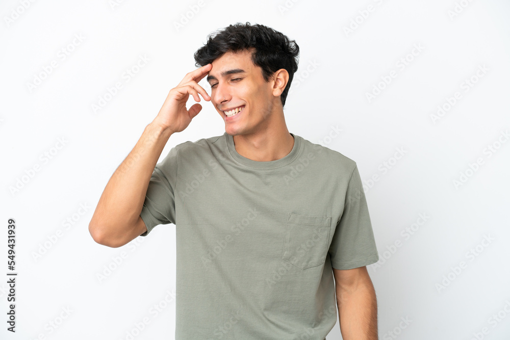 Young Argentinian man isolated on white background laughing Young Argentinian man isolated on white background laughing