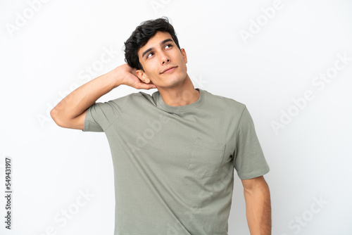 Young Argentinian man isolated on white background thinking an idea