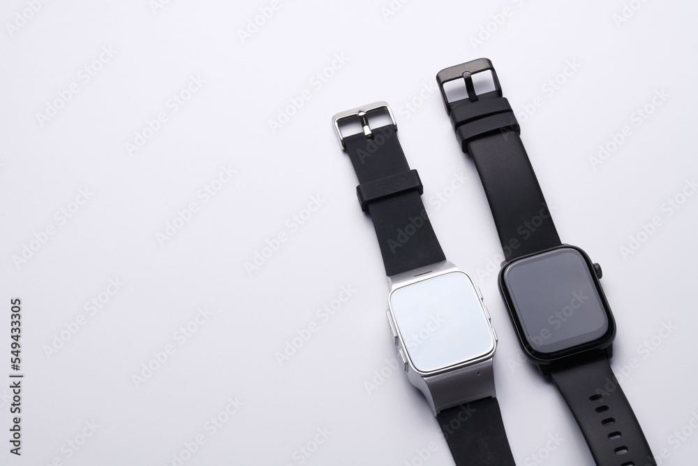 Wireless electronic smart watch with Touch Screen close-up isolated on white background. Bluetooth Bracelet, black band fitness tracker Wireless electronic smart watch with Touch Screen close-up isolated on white background. Bluetooth Bracelet, black band fitness tracker