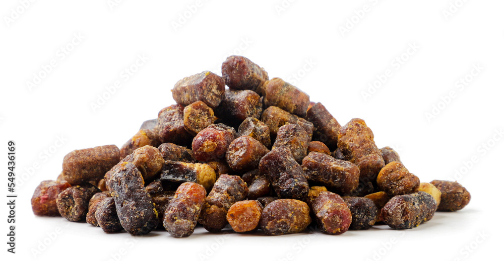 Heap of bee perga, bee pollen granules on a white background. Isolated Heap of bee perga, bee pollen granules on a white background. Isolated