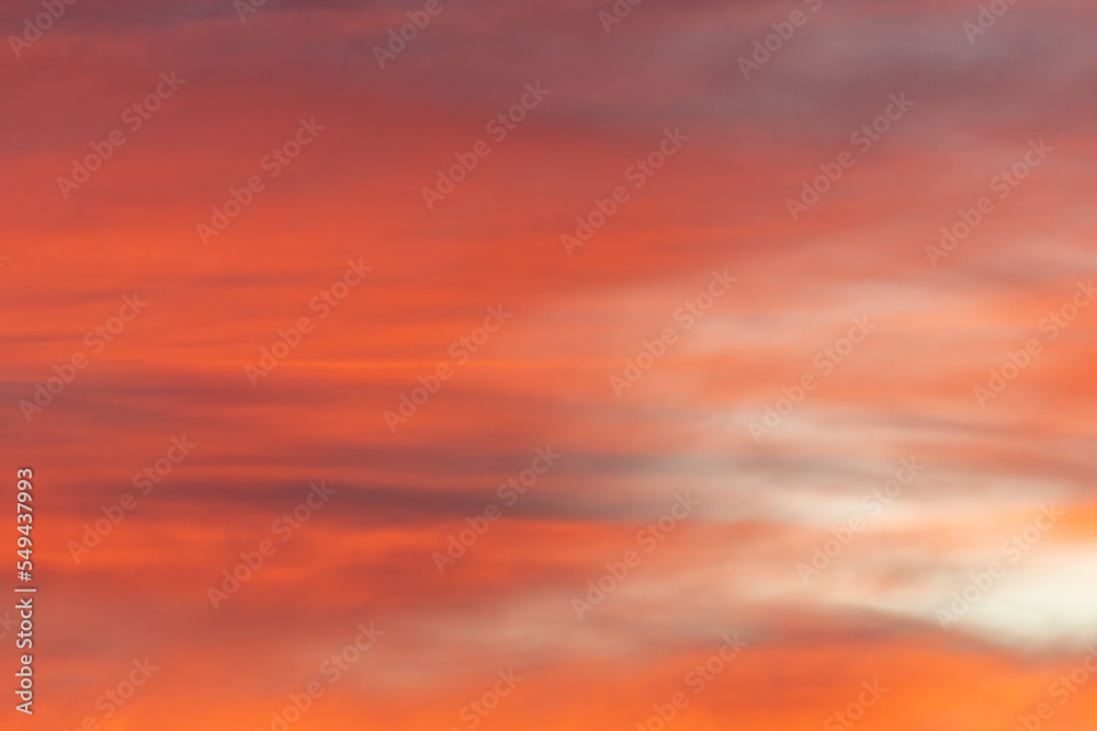 Sky of pink and orange clouds in the evening at sunset.