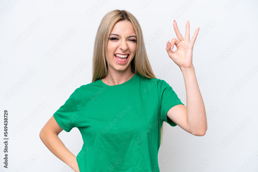 Fototapeta premium Pretty blonde woman isolated on white background showing ok sign with fingers