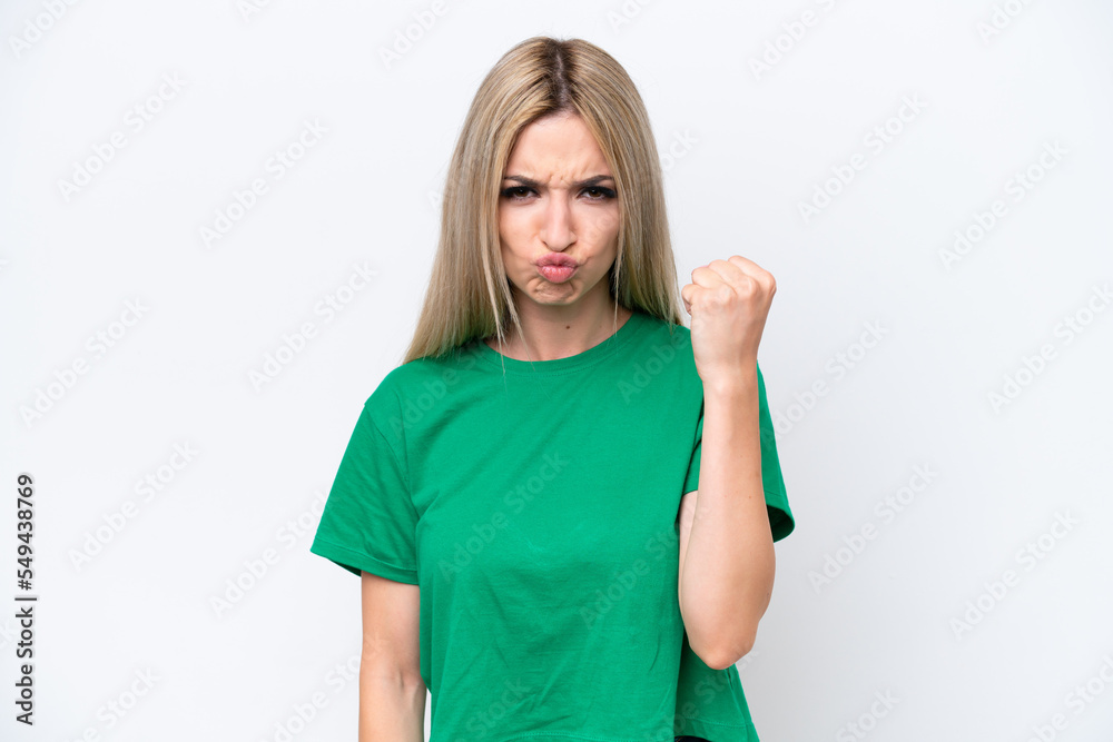 Pretty blonde woman isolated on white background with unhappy expression
