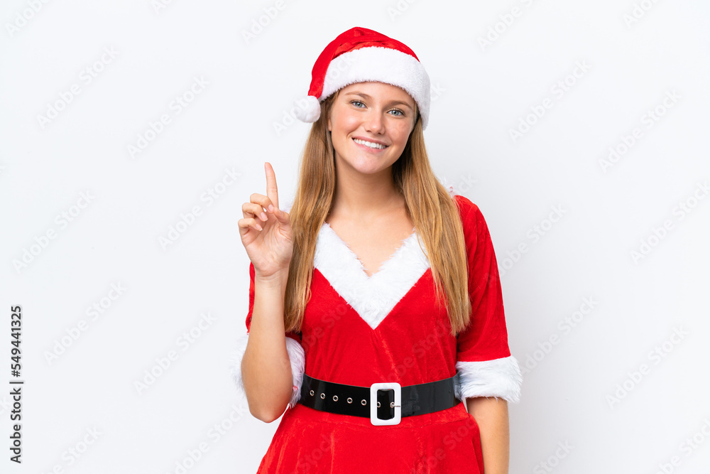 Young caucasian woman dressed as mama noel isolated on white background showing and lifting a finger in sign of the best Young caucasian woman dressed as mama noel isolated on white background showing and lifting a finger in sign of the best