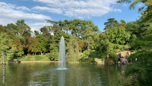 Running water jet fountain at the Buen Retiro Park (Parque del Buen Retiro). View from Crystal Palace (Palacio de Cristal) side. This park is very popular recreation place. Madrid, Spain