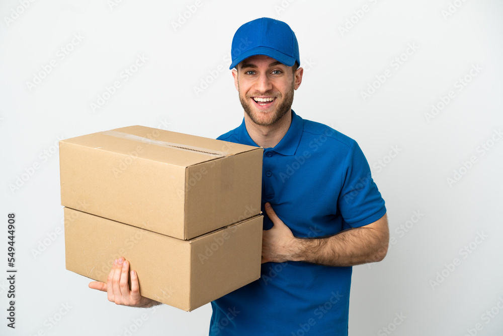 Delivery man over isolated white background smiling a lot Delivery man over isolated white background smiling a lot