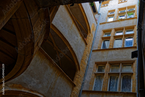 LYON, FRANCE, November 26, 2022 : Traboule in Juiverie street. A traboule is a traditional passageway through houses between two streets. photo