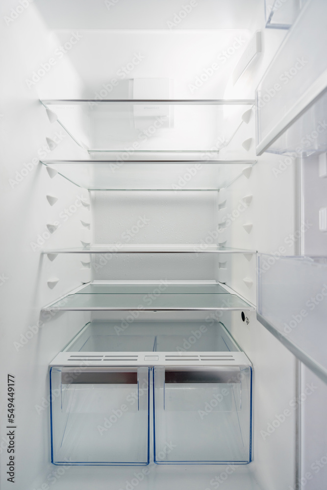 closeup of white clean refrigerator for store food, inside view