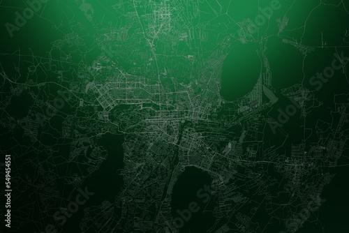 Street map of Chelyabinsk (Russia) engraved on green metal background. Light is coming from top. 3d render, illustration photo