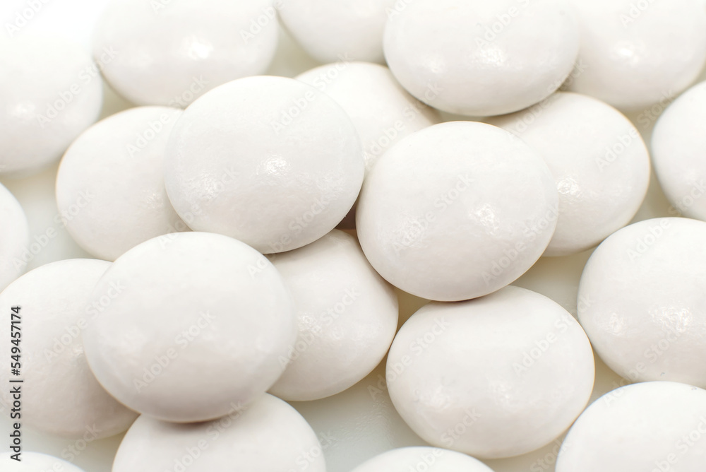 Medical tablet on a white background close-up. Vitamins isolate Medical tablet on a white background close-up. Vitamins isolate