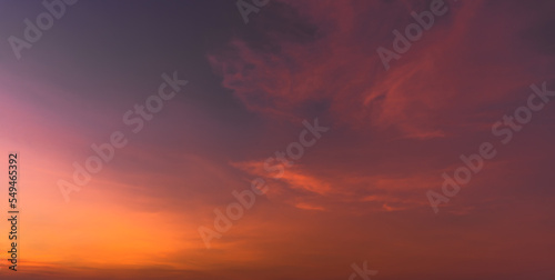 Sunset sky in the evening on twilight with orange, red sunlight clouds, Dusk sky background 