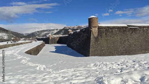 Winter landscape with a view of a snowy mountain.