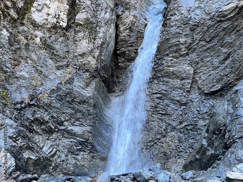 Waterfalls on the Schräabach creek in the Calfeisental alpine valley and in the UNESCO World Heritage Tectonic Arena Sardona (UNESCO-Welterbe Tektonikarena Sardona), Vättis - Switzerland (Schweiz) photo