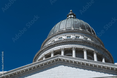 The architecture of buildings windows  stucco molding  and columns on a sunny day in the USA. High-quality photo