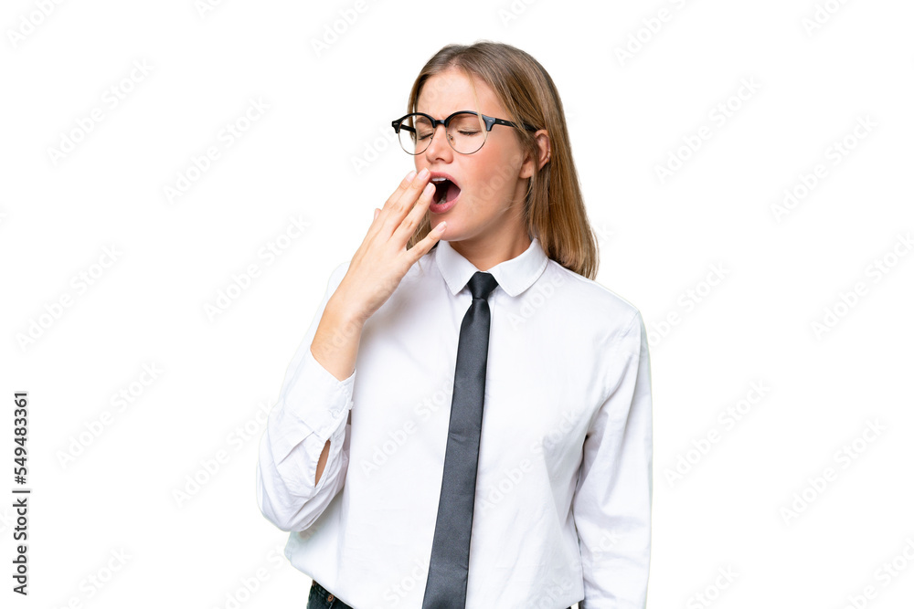 Young business caucasian woman over isolated background yawning and covering wide open mouth with hand Young business caucasian woman over isolated background yawning and covering wide open mouth with hand