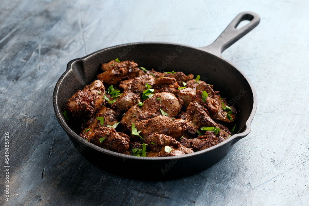 Fried chicken liver, poultry meat food with herbs Fried chicken liver, poultry meat food with herbs