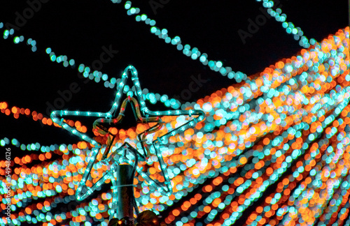 christmas lights. christmas star. christmas lights in the shape of a star. illuminations. festivities. close up of lights. end of the year parties. 