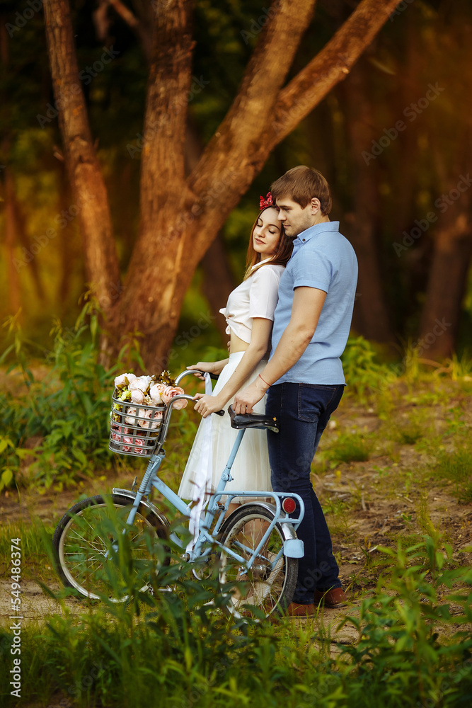 Fototapeta premium Loving couple on vintage bike
