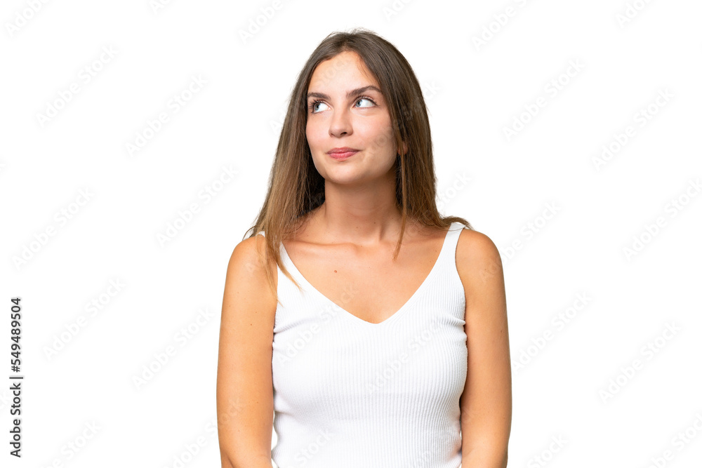 Young pretty woman over isolated background having doubts while looking up Young pretty woman over isolated background having doubts while looking up