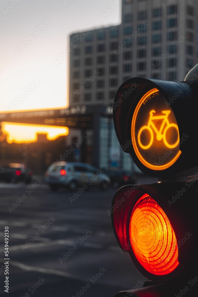 Obraz premium Selective focus shot of a bicycle traffic light in Berlin, Germany