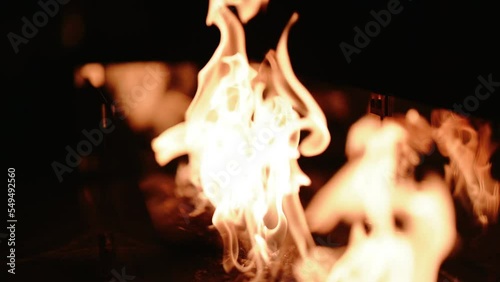 The fire burns on the summer terrace. Gas heater on the summer terrace of the restaurant. Fire texture.
