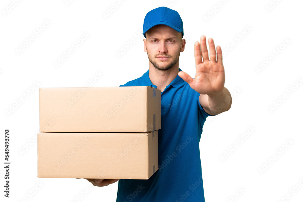 Delivery caucasian man over isolated background making stop gesture Delivery caucasian man over isolated background making stop gesture