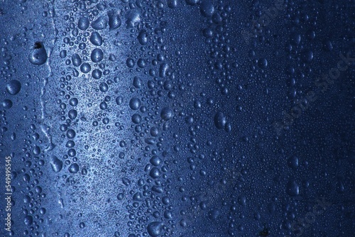Print op canvas Blue surface of wet drops texture background