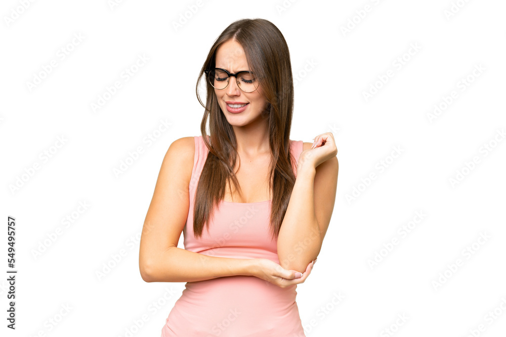 Young pretty caucasian woman over isolated background with pain in elbow Young pretty caucasian woman over isolated background with pain in elbow