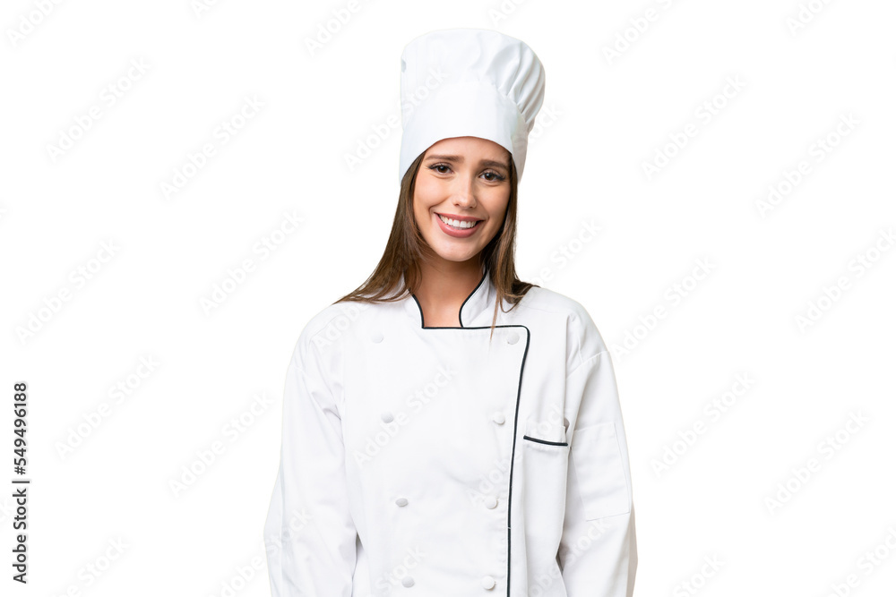 Young chef caucasian woman over isolated background laughing Young chef caucasian woman over isolated background laughing