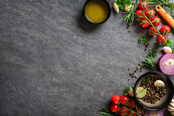 Culinary concept. Dark cooking food background Vegetables and spices on the kitchen table with copy space top view