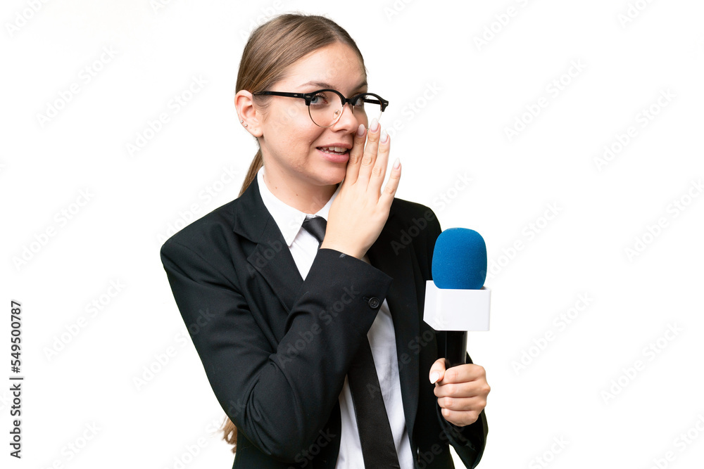 Young TV presenter caucasian woman over isolated background whispering something Young TV presenter caucasian woman over isolated background whispering something