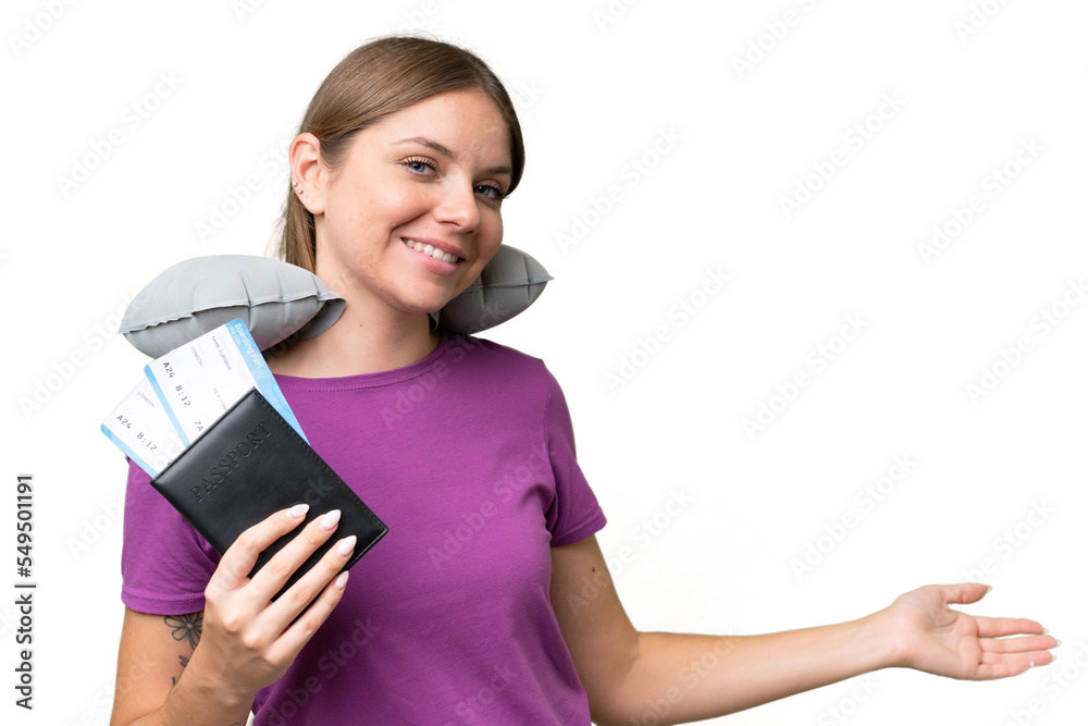 Young beautiful blonde woman with Inflatable travel Pillow over isolated background extending hands to the side for inviting to come Young beautiful blonde woman with Inflatable travel Pillow over isolated background extending hands to the side for inviting to come