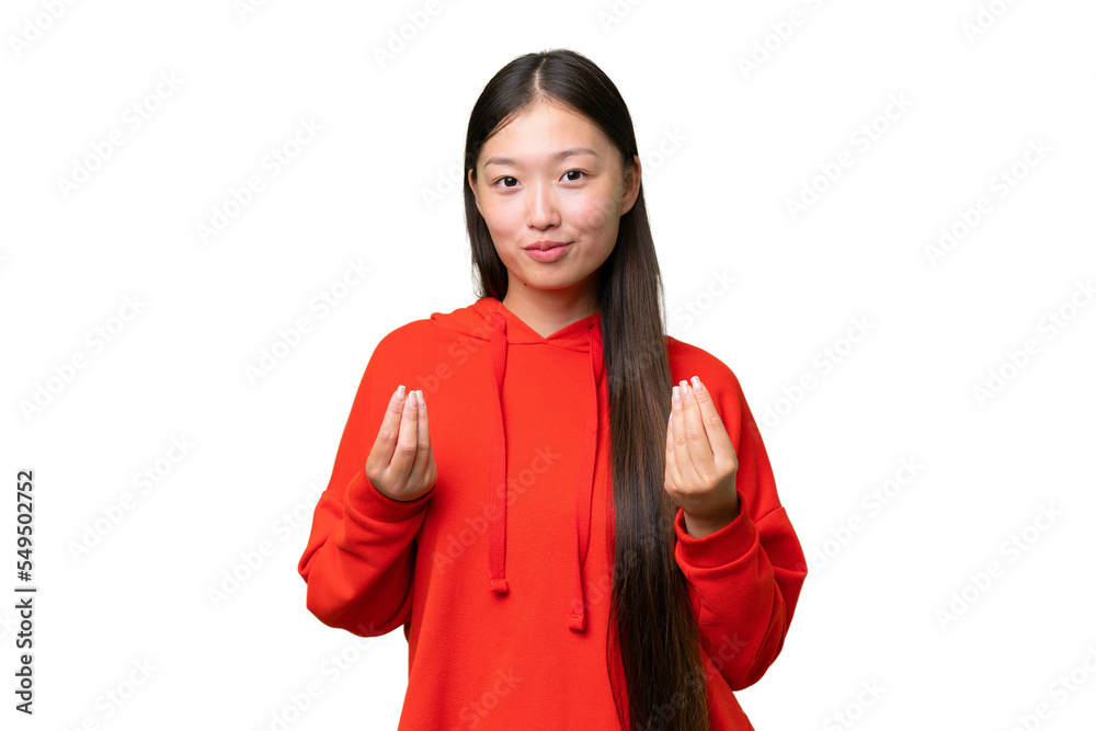 Young Asian woman over isolated background showing and lifting a finger in sign of the best Young Asian woman over isolated background showing and lifting a finger in sign of the best