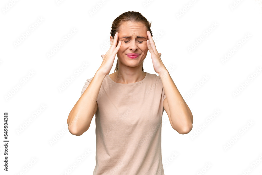 Young caucasian woman over isolated background with headache Young caucasian woman over isolated background with headache